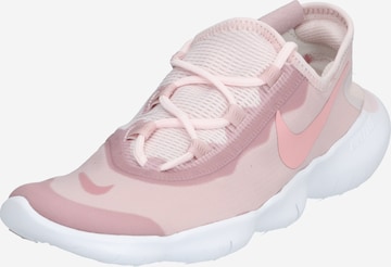 Chaussure de course 'Free ' NIKE en rose : devant