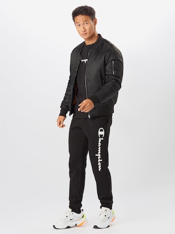 Champion Authentic Athletic Apparel Tapered Pants in Black