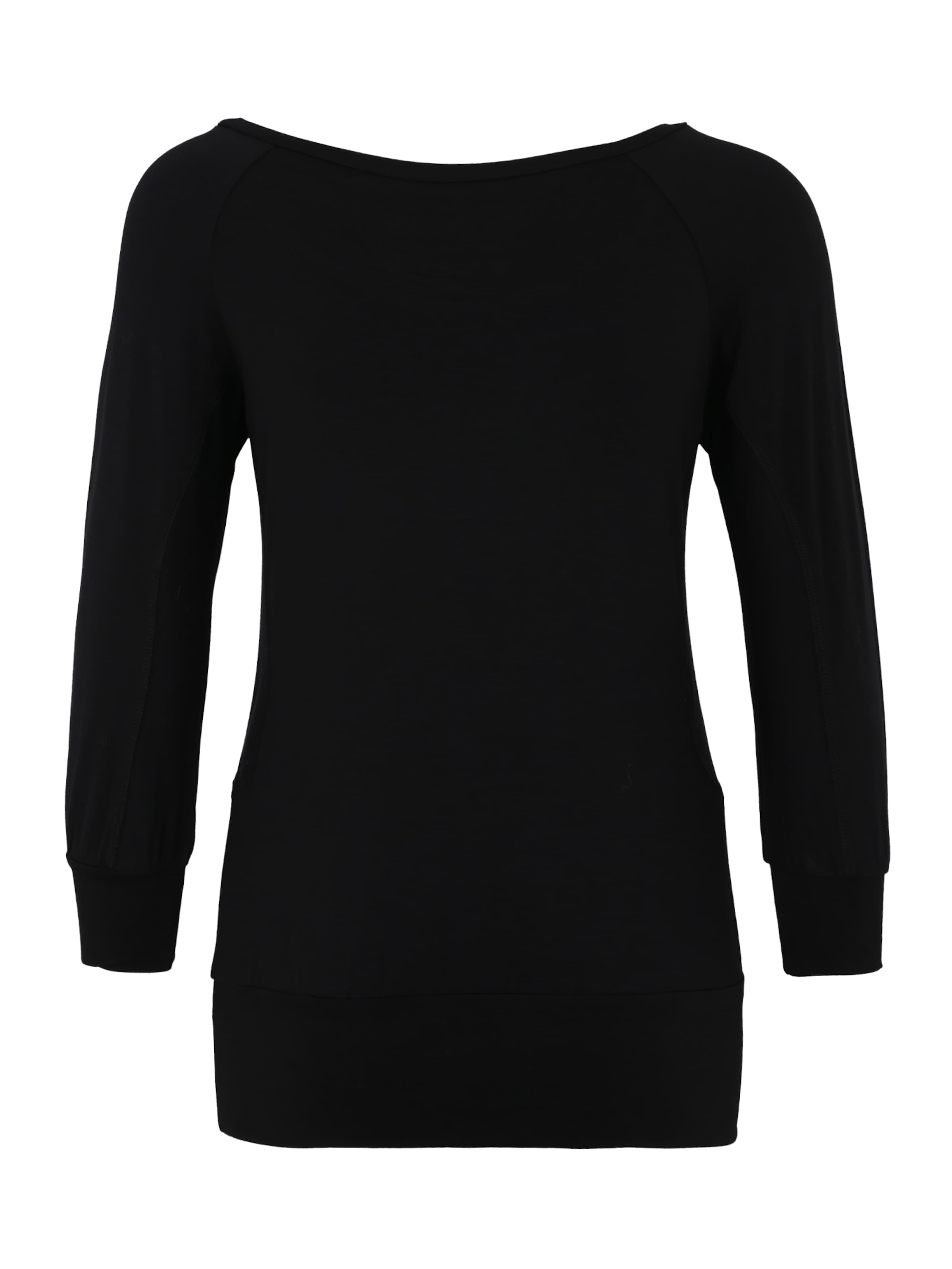 CURARE Yogawear Λειτουργικό μπλουζάκι 'Flow' σε μαύρο: πίσω