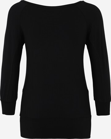 CURARE Yogawear Koszulka funkcyjna 'Flow' w kolorze czarny: tył