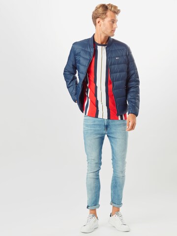 Tommy Jeans Regular fit Prehodna jakna | modra barva