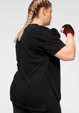 Nike Sportswear Performance shirt in Black