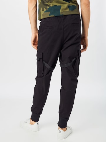 Urban Classics - Tapered Pantalón cargo 'Tactical' en negro