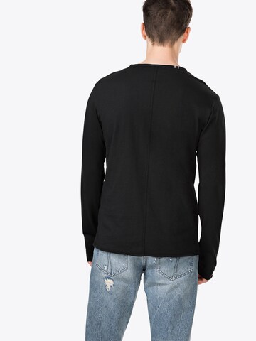 REPLAY - Camiseta en negro: atrás