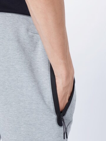 Nike Sportswear Конический (Tapered) Штаны 'Tech Fleece' в Серый