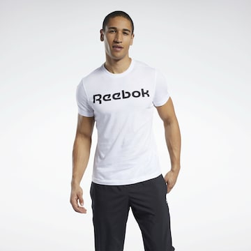 Reebok - Camiseta funcional en blanco: frente