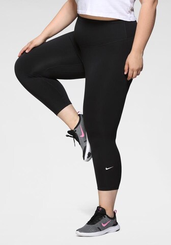 NIKE Skinny Workout Pants in Black: front