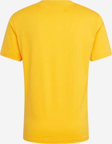 Champion Authentic Athletic Apparel Regularny krój Koszulka w kolorze żółty