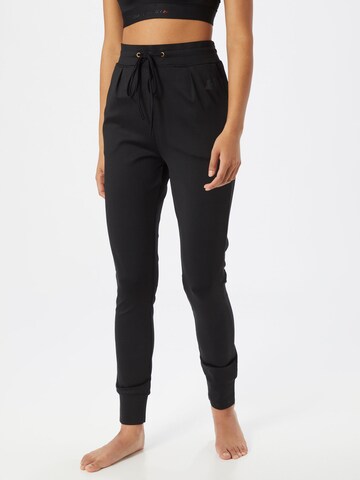 Effilé Pantalon de sport CURARE Yogawear en noir : devant