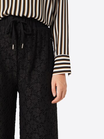 Urban Classics Wide leg Trousers in Black