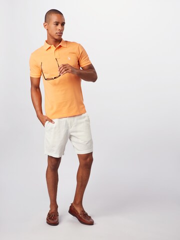 Polo Ralph Lauren Tričko 'SSKCSLIM1-SHORT SLEEVE-KNIT' – oranžová