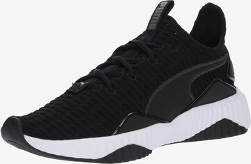 Chaussure de sport 'Defy' PUMA en noir : devant