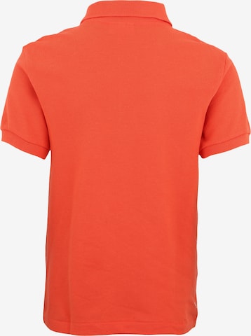 Tricou de la LACOSTE pe portocaliu: spate