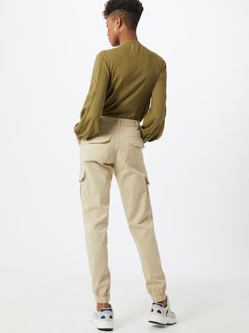 Urban Classics Tapered Gargohousut värissä beige