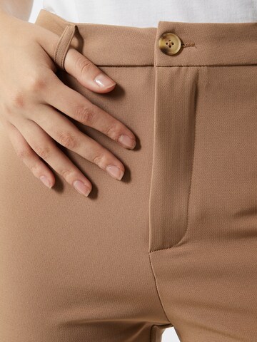 Moves Flared Pants 'sassy' in Beige