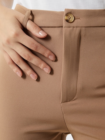 Moves Flared Pants 'sassy' in Beige