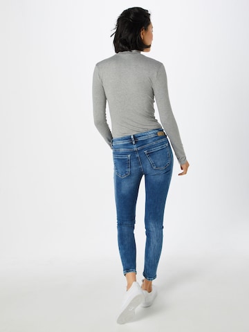 Skinny Jean 'Faye' Gang en bleu : derrière