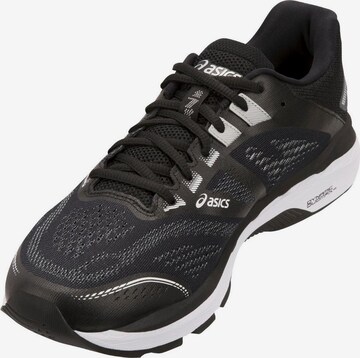 Chaussure de course 'GT-2000 7' ASICS en noir : devant