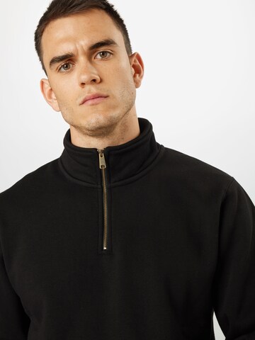 Carhartt WIP Regular Fit Sweatshirt 'Chase' i sort