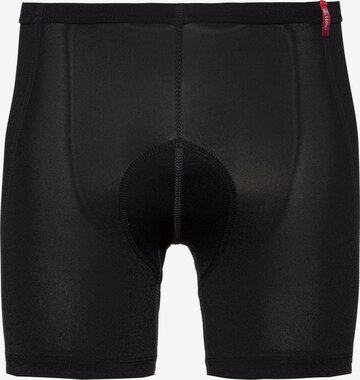 Löffler Slim fit Workout Pants in Black: front
