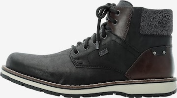 Rieker - Botas con cordones en negro