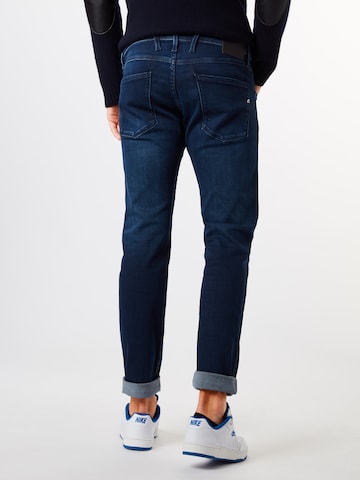 Coupe slim Jean 'Anbass' REPLAY en bleu : derrière