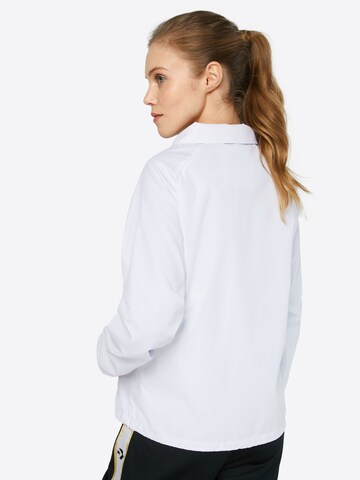 Veste mi-saison Urban Classics en blanc : derrière