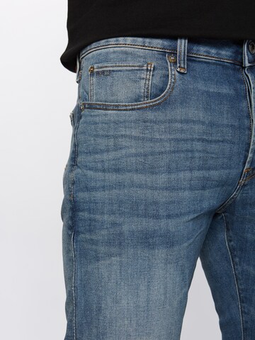 Coupe slim Jean G-Star RAW en bleu