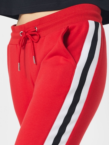 Urban Classics - Tapered Pantalón en rojo