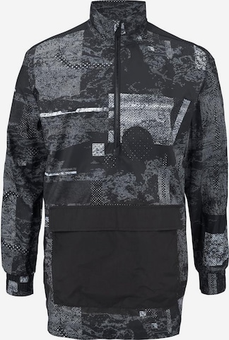 PUMA Athletic Jacket 'Energy Windbreaker' in Black: front