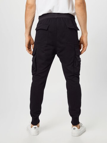 Urban Classics Tapered Cargo Pants in Black