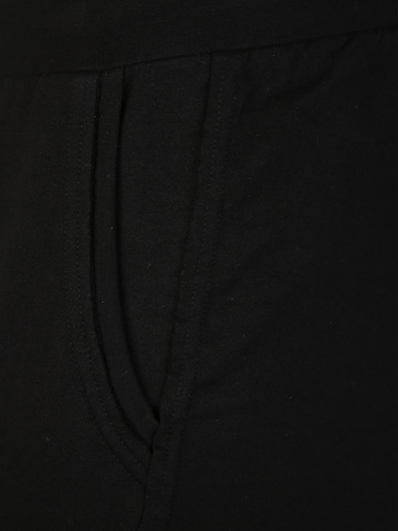 Tapered Pantaloni 'Terry' di Urban Classics in nero
