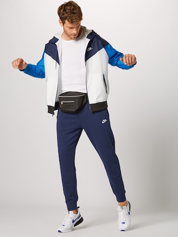 Nike Sportswear Zúžený Kalhoty – modrá