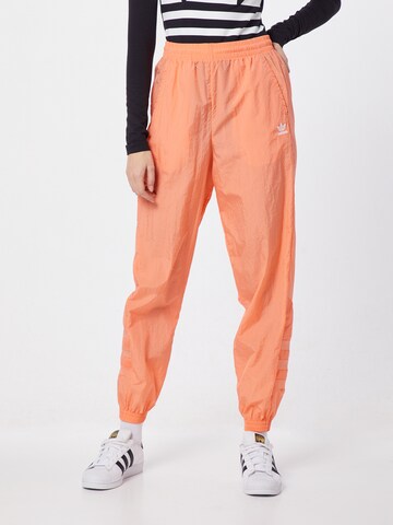 ADIDAS ORIGINALS Tapered Broek in Oranje: voorkant