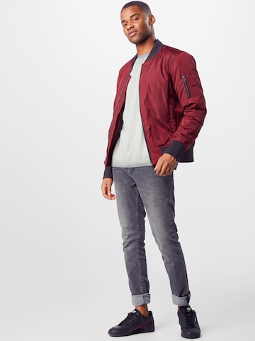 Veste mi-saison Urban Classics en rouge