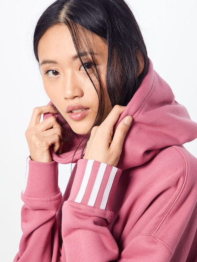 ADIDAS ORIGINALS Sweatshirt 'VOCAL CROP' in pink weiß ADIDAS ORIGINALS Sweatshirt VOCAL HOODIE' in rosa | ABOUT YOU