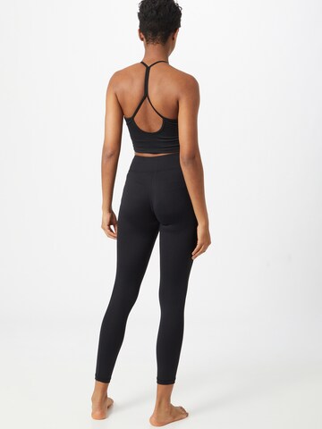 CURARE Yogawear Skinny Sporthose in Schwarz