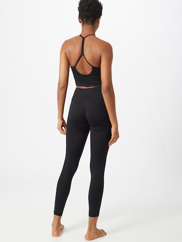 Skinny Pantalon de sport CURARE Yogawear en noir