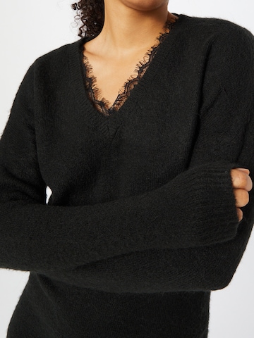 VERO MODA Knitted dress 'Minniecare' in Black