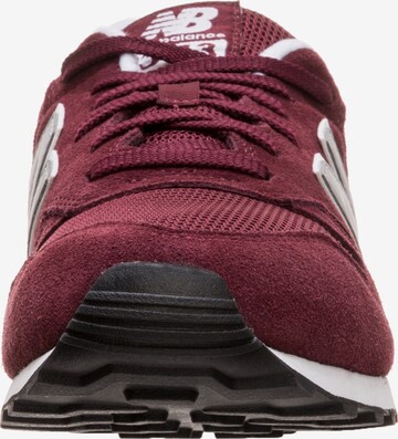 Baskets basses new balance en rouge