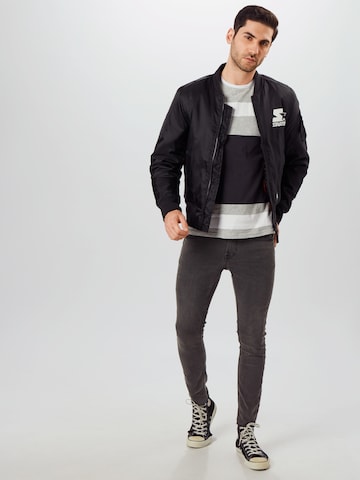 Starter Black Label Regular Fit Overgangsjakke i sort