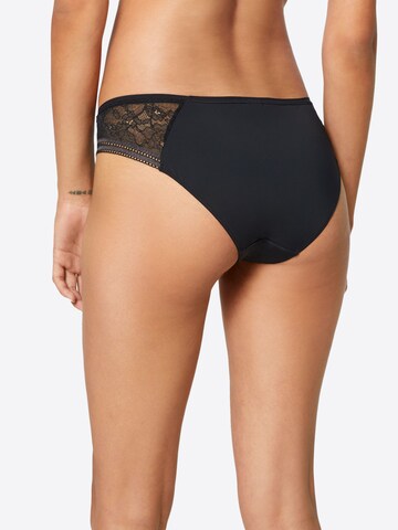 Slip Skiny en noir : derrière