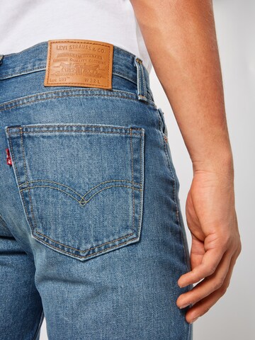 LEVI'S ® Slimfit Shorts '511' in Blau