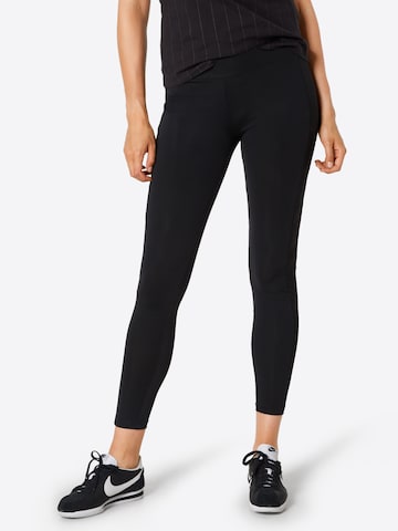 Urban Classics Skinny Leggings in Black: front