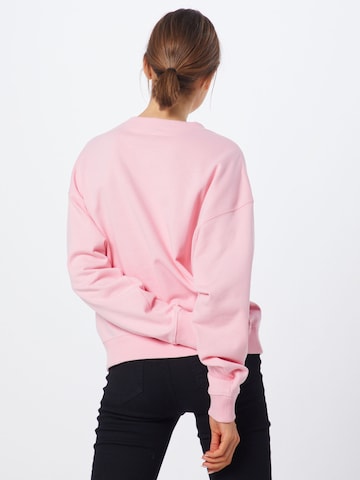 Sweat-shirt Champion Authentic Athletic Apparel en rose