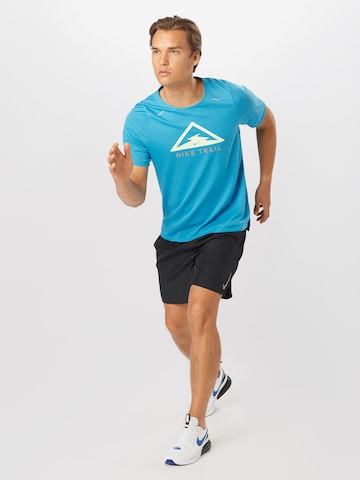 NIKE Regular fit Functioneel shirt 'Rise 365 Trail' in Blauw