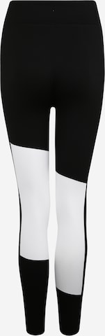 Skinny Pantaloni sport de la PUMA pe negru: spate