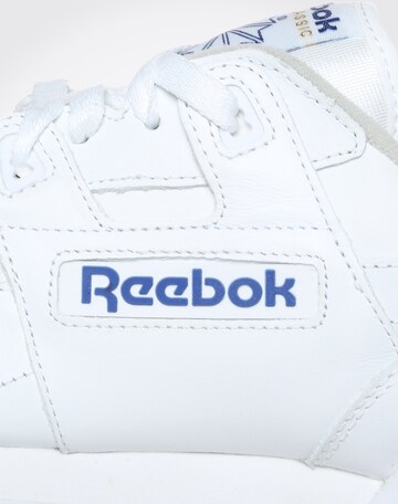 Baskets basses 'Workout Plus' Reebok en blanc