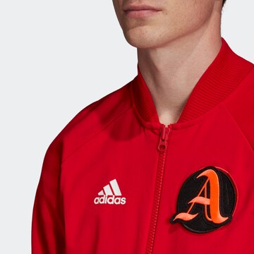 ADIDAS SPORTSWEAR Athletic Zip-Up Hoodie in Red: front