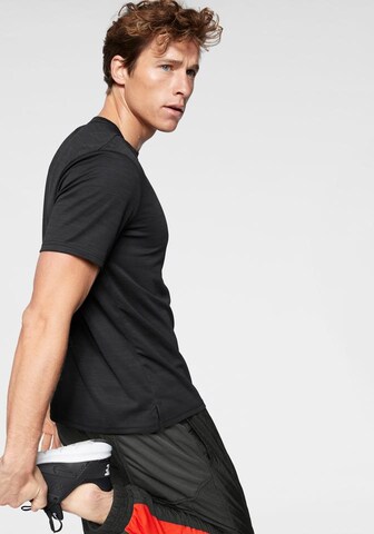 NIKE Regular Fit Funktionsshirt 'Superset' in Schwarz